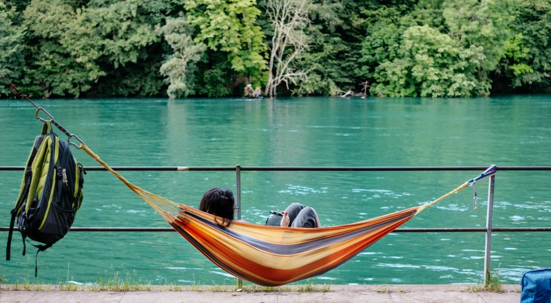 a girl lounging in a hammock