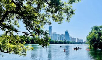 People out enjoying the water on a sunny day in Austin, Texas