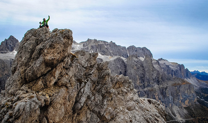 climbing a mountain in the Himalayas and conquering travel