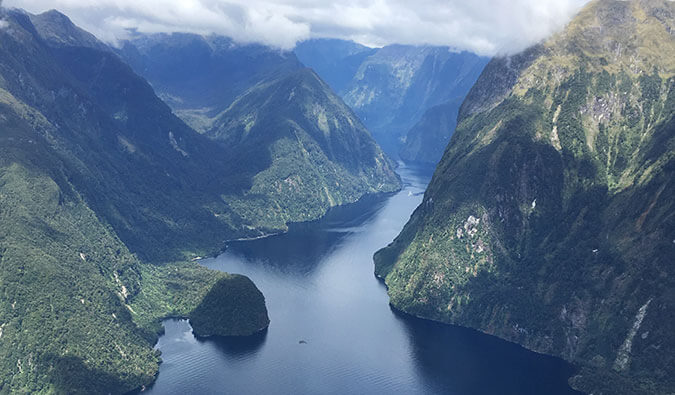 Image of Fiordlands in New Zealand. Water, mountains, and sky