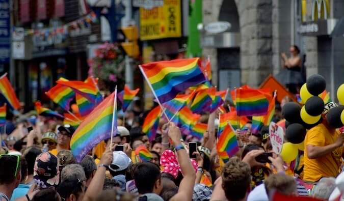 People waving the lgbtq flag