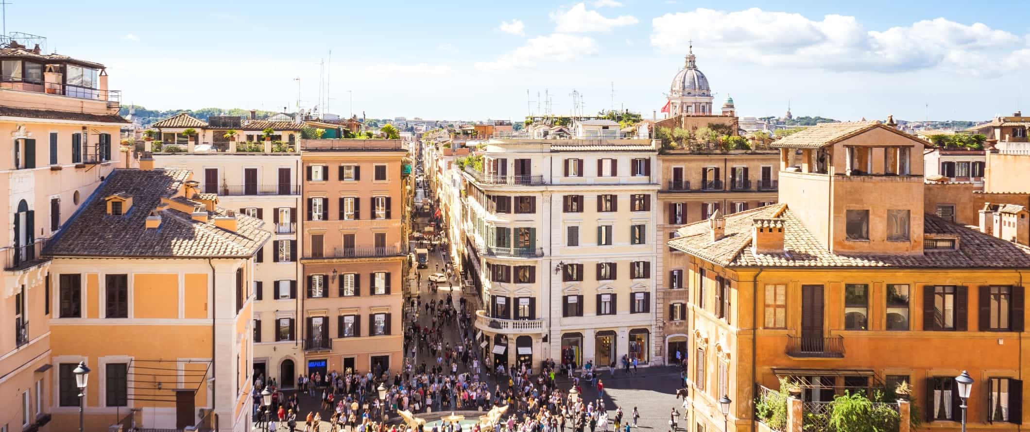 View over pastel colored buildings and terracotta rooftops in Rome, Italy